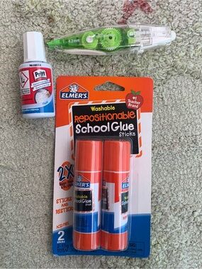 Lot of 3 school supplies includes pack of glue sticks, whiteout tape and liquids